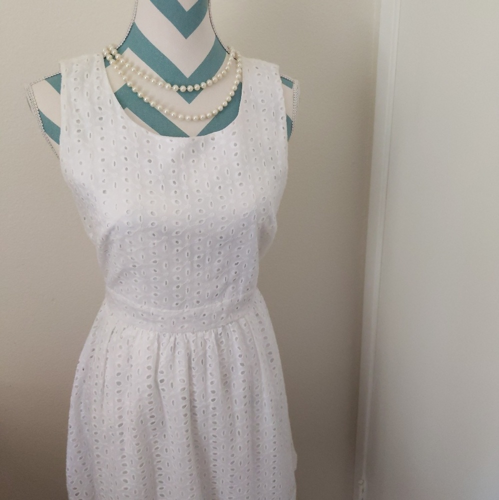 White dress with floral inlay pattern